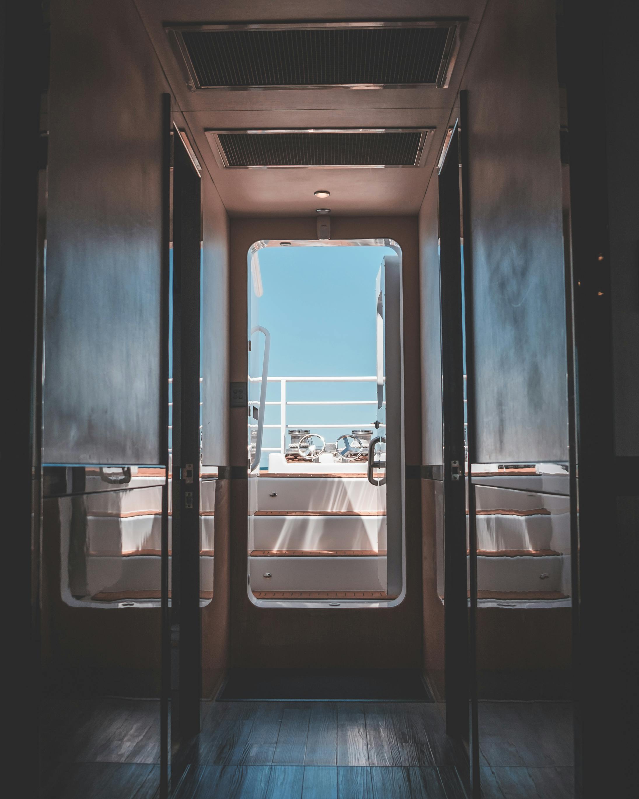 narrow corridor in modern boat in daytime