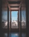 Narrow corridor in modern boat in daytime