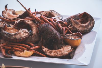 Platter of grilled lobster and shellfish, photo by Lachlan Ross on Pexels