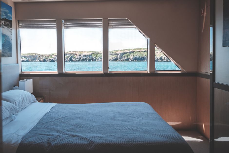 Cozy yacht interior cabin with controlled climate and thermal insulation Cozy yacht interior cabin with controlled climate and thermal insulation