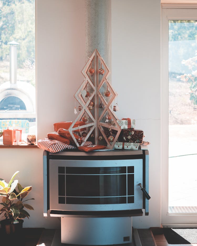 Modern Fireplace With Christmas Decorations In Lounge