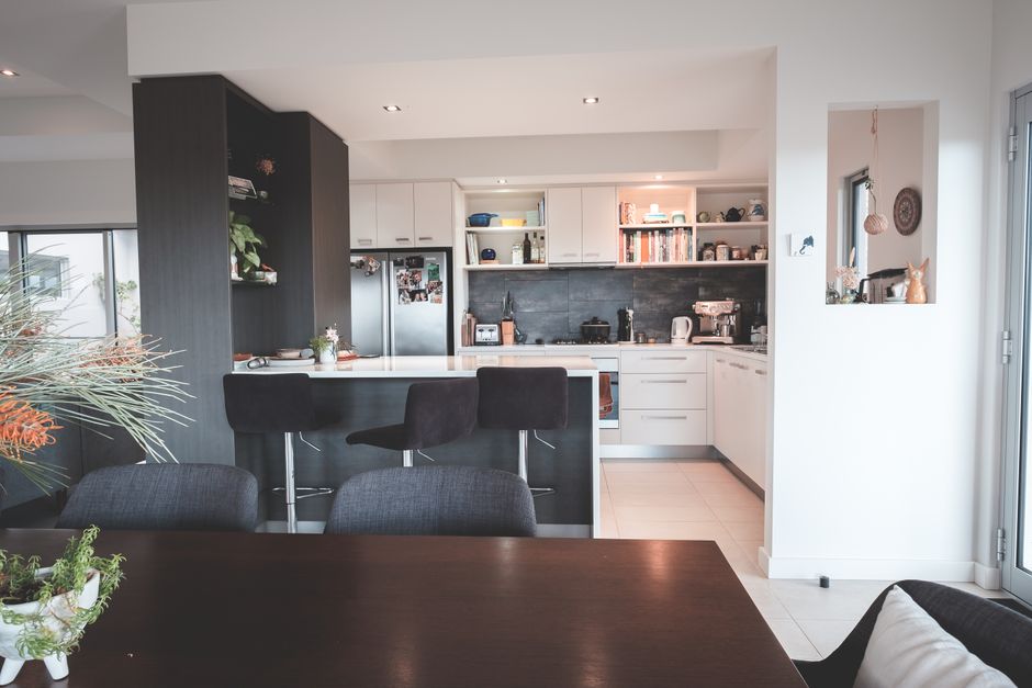 Photo by Lachlan Ross on Pexels Interior of dining room and kitchen with wooden furniture in modern villa on sunny day
