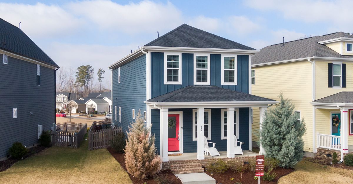 A beautiful modern family home with a blue facade in Wendell, North Carolina.