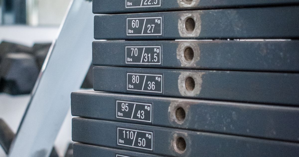 A person training steadily in a gym, unhurried