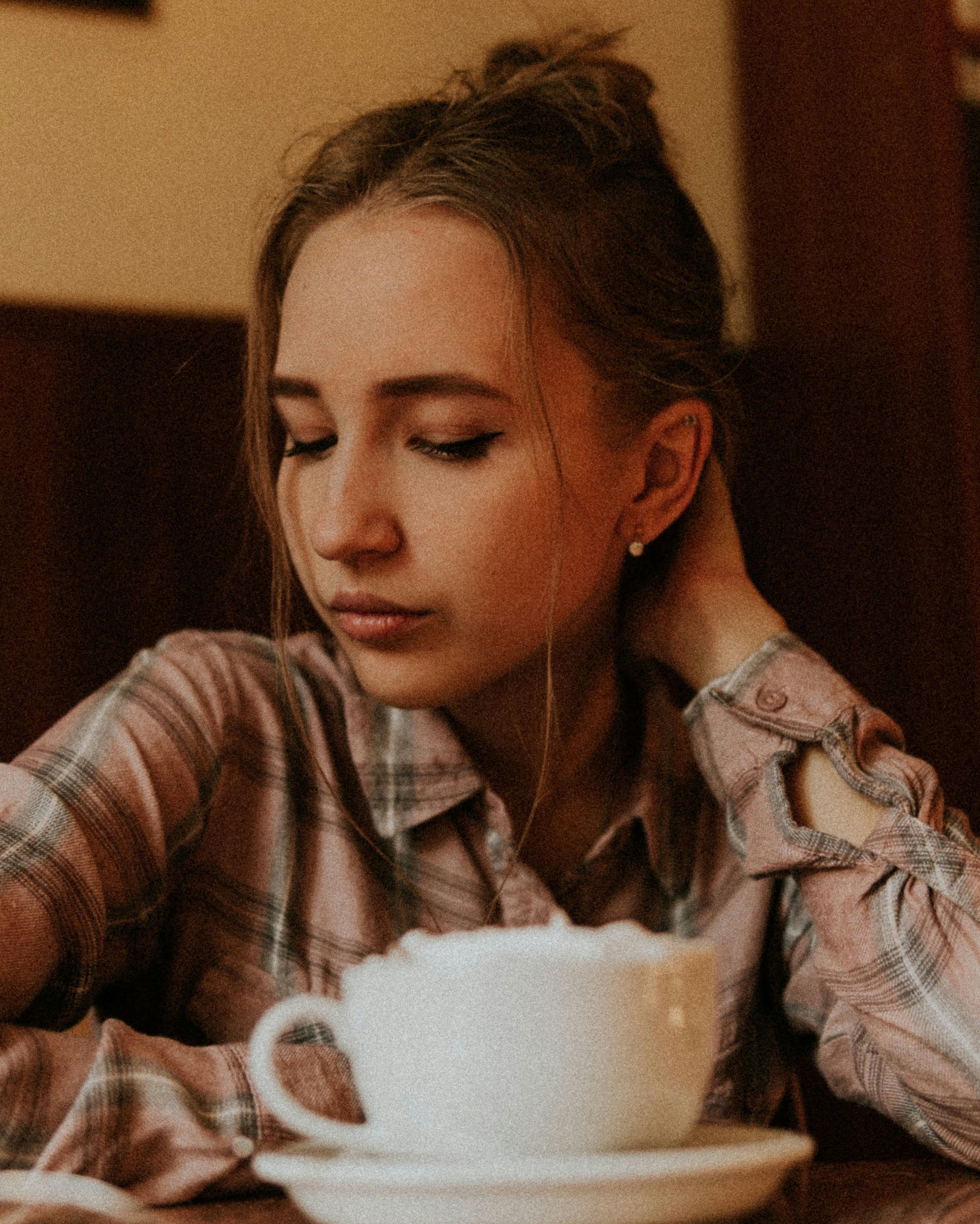Free Photo  Girl drinking a cup of coffee