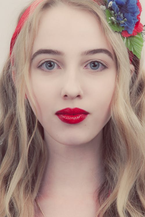 A Blonde Woman With Red Lips 