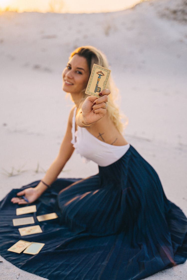 Woman Showing A Tarot Card