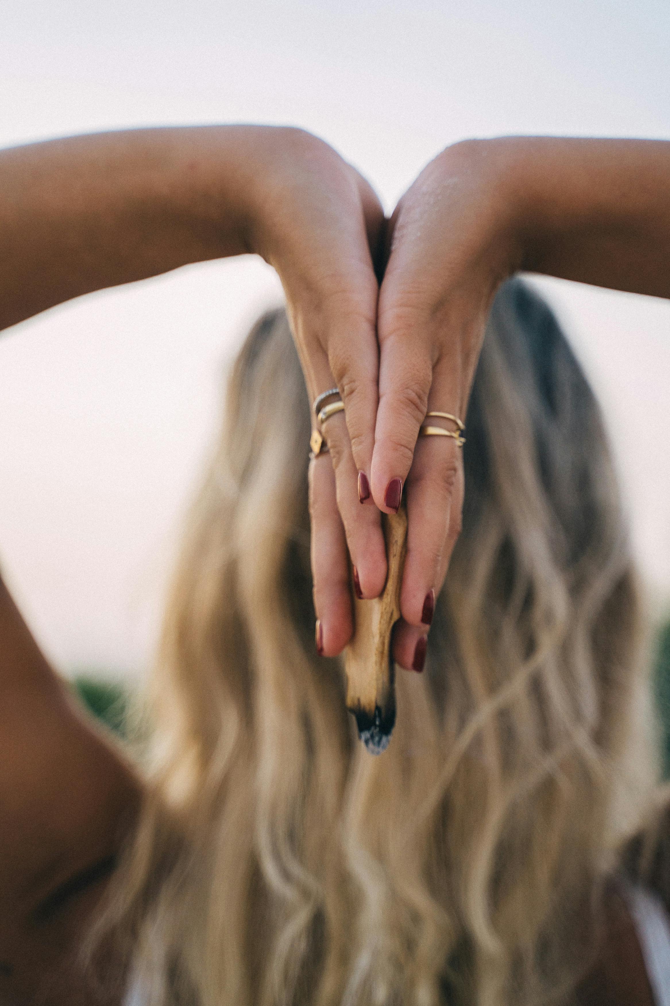Woman Wearing Gold Ring and Gold Ring