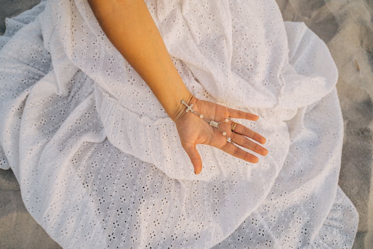 Close-Up Shot Of A Person Holding A Cross