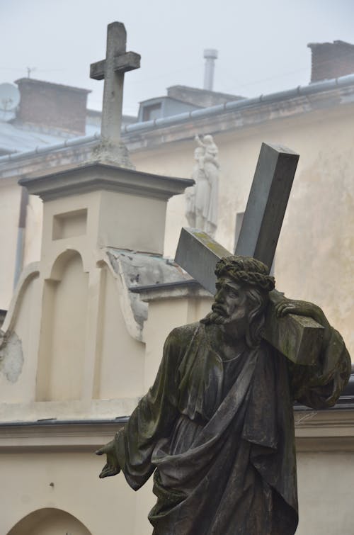 Free Close-up of a Sculpture of Jesus Christ Carrying a Cross Stock Photo