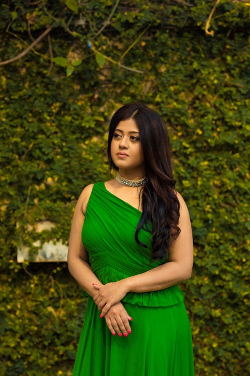 A Young Woman in a Green Dress