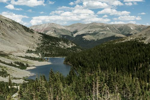 Free Breathtaking view of a mountain landscape with a pine forest and lake in Colorado, USA. Stock Photo