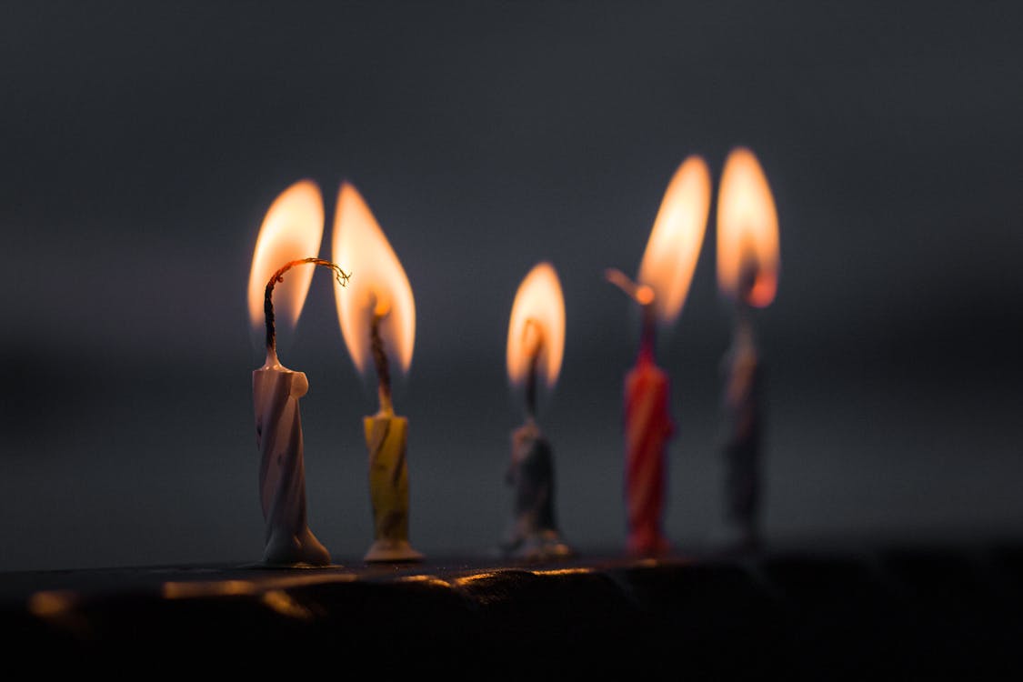 Close-Up Shot of Lighted Candles