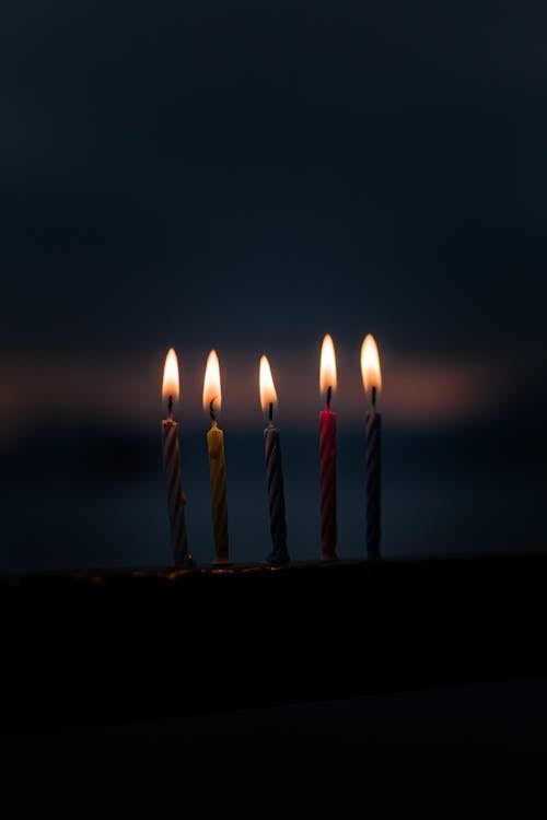 Close-Up Shot of Lighted Candles