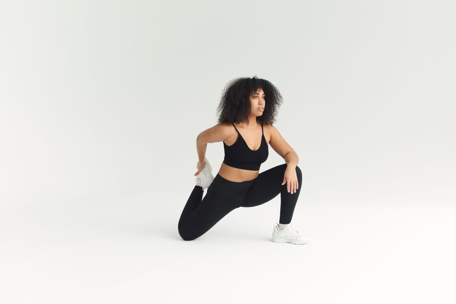 A person demonstrating a full-body stretching routine - 5 easy stretching exercises A person demonstrating a full-body stretching routine - 5 easy stretching exercises