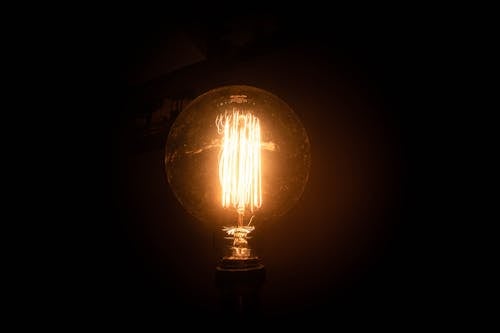 Free Brown and Black Lamp Turned on during Nighttime Stock Photo