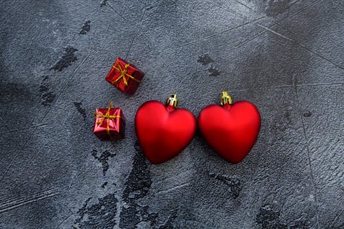 Free Decorative red hearts and gift boxes Stock Photo