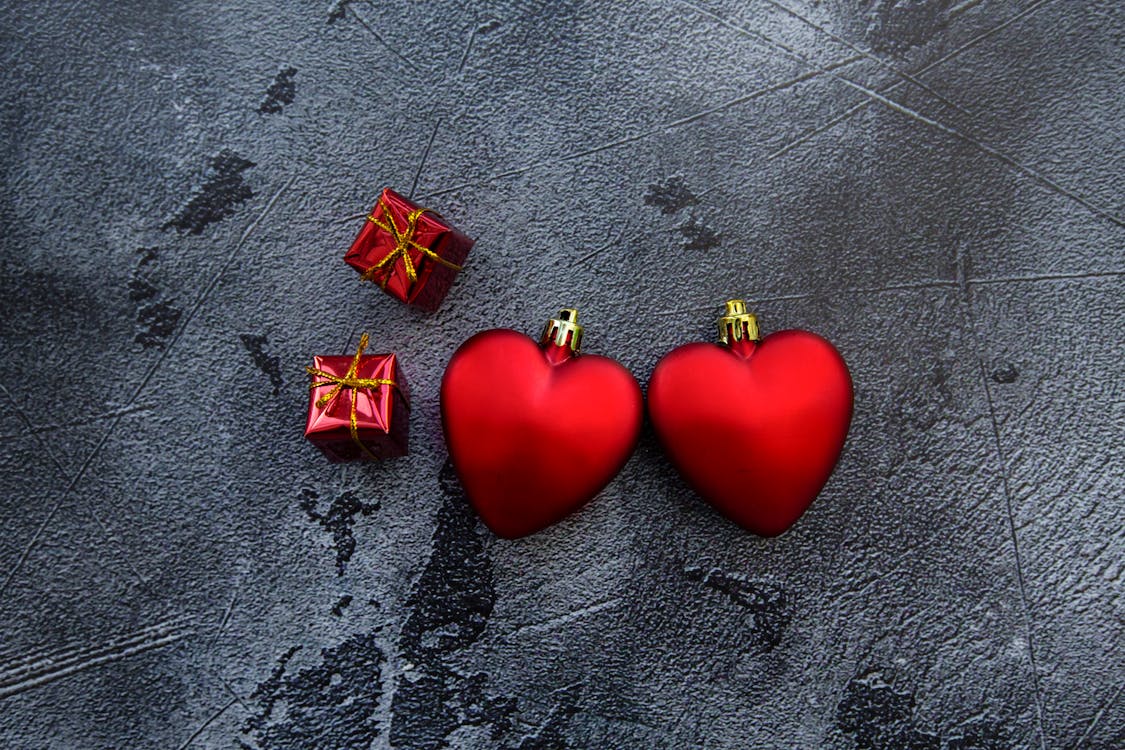 Free Decorative red hearts and gift boxes Stock Photo
