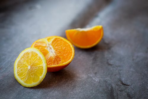 Fresh cut lemon and oranges