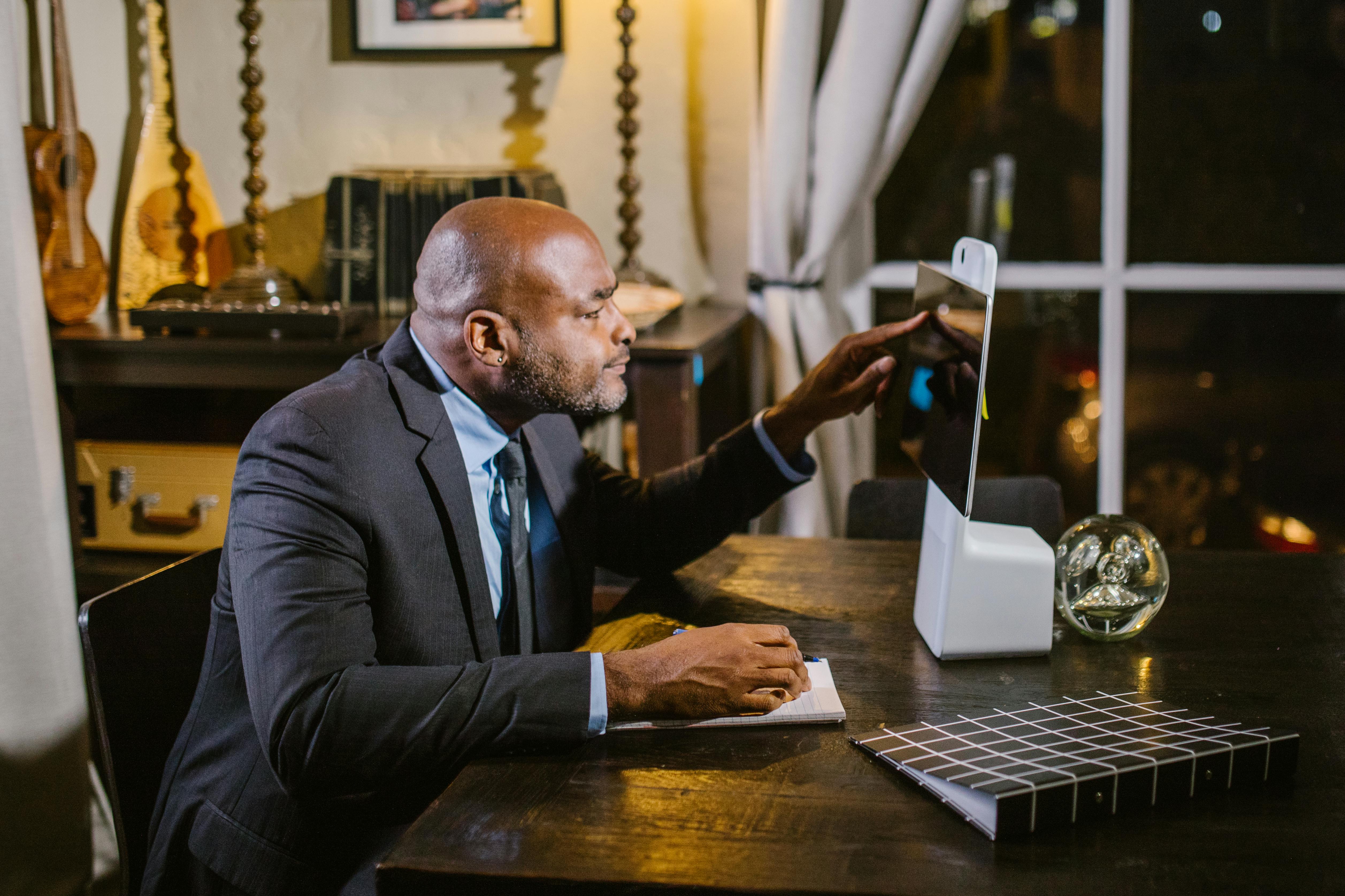 businessman suit desk laptop