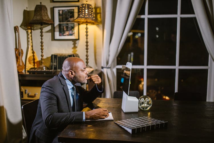 A Man Looking At The Screen