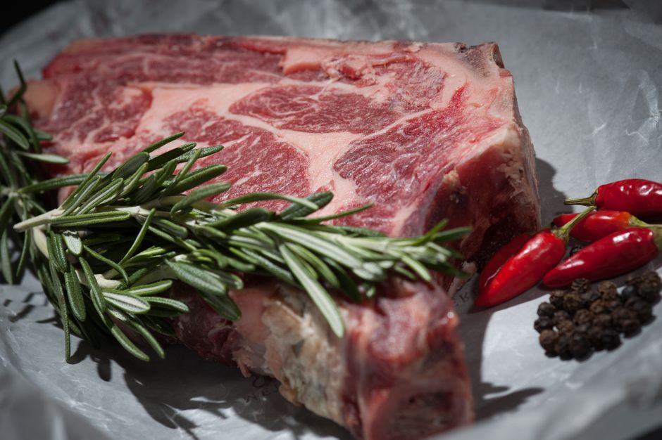 Fresh hand-cut steak with rosemary