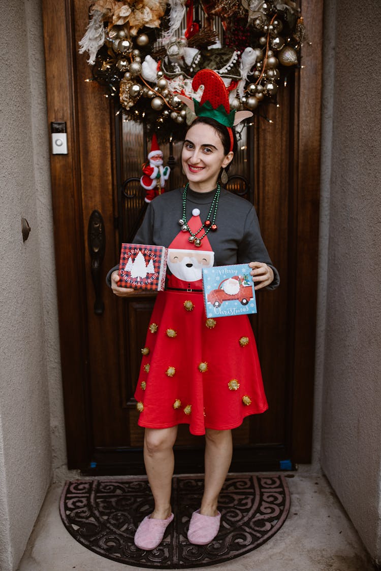 Woman Wearing Christmas Clothes In A Hall 