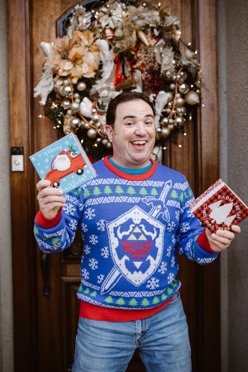 Man Holding up Gifts 