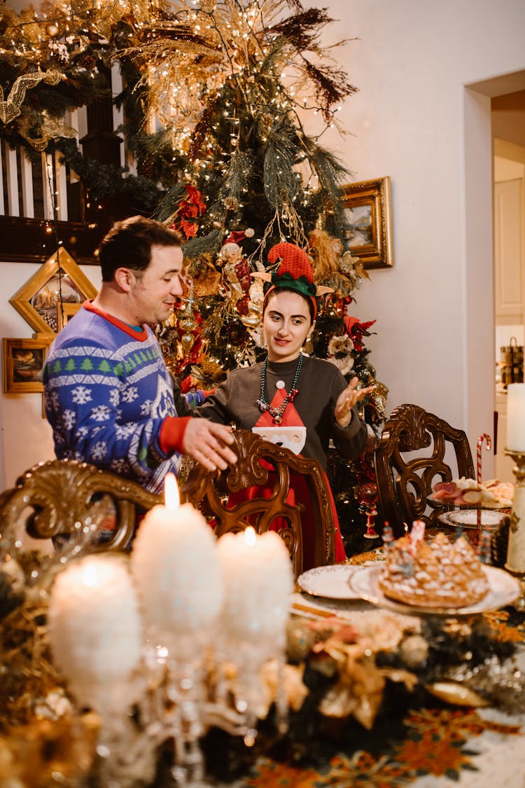 A Couple Celebrating Christmas At Home