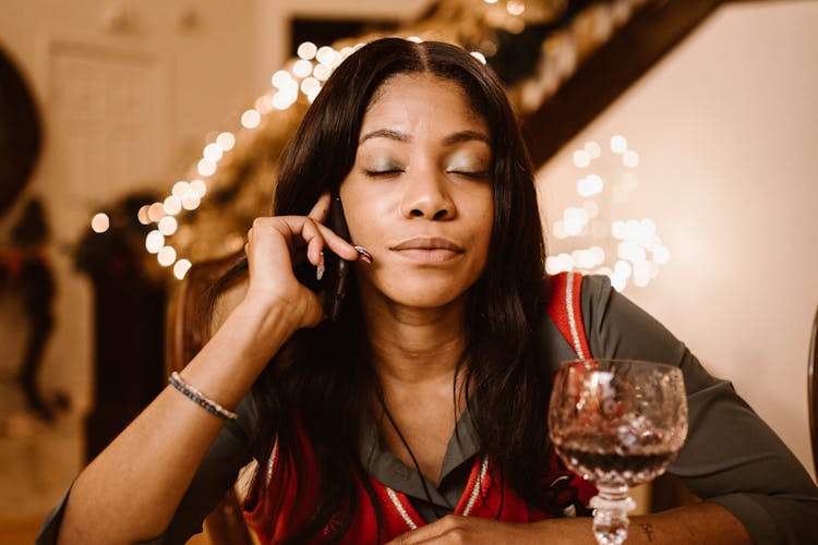 A Woman Talking On The Phone