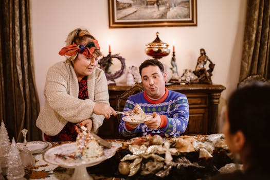 A joyful family moment during Christmas with cake cutting and festive decorations indoors.