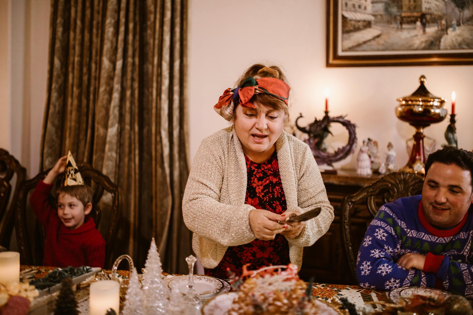 An Elderly Woman Wearing Cardigan and a Headscarf