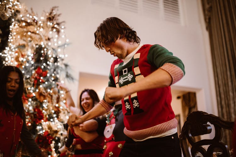 A Man In Christmas Sweater Dancing