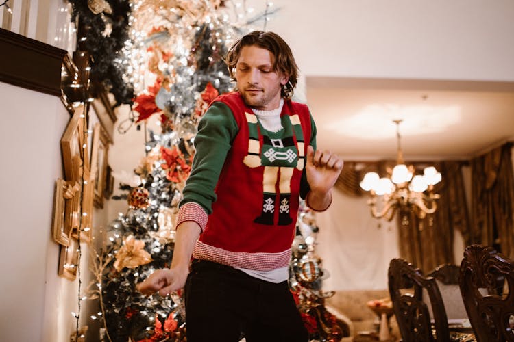 A Man In Christmas Sweater Dancing