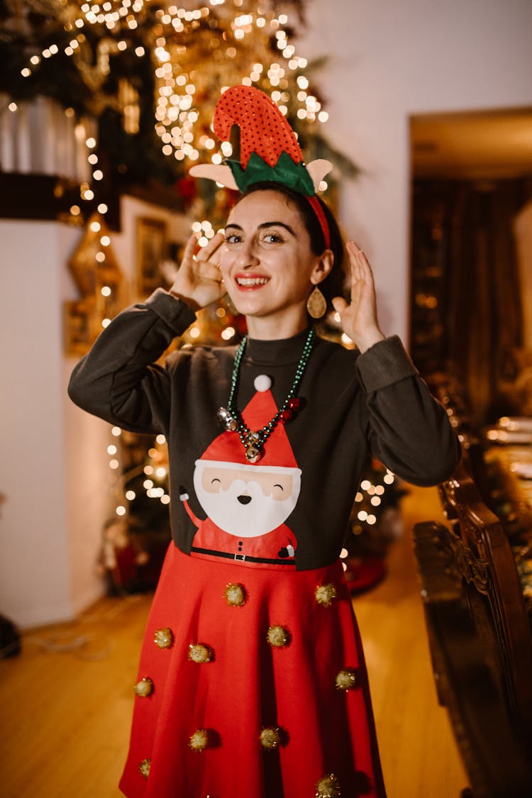 Woman In Christmas Outfit Smiling