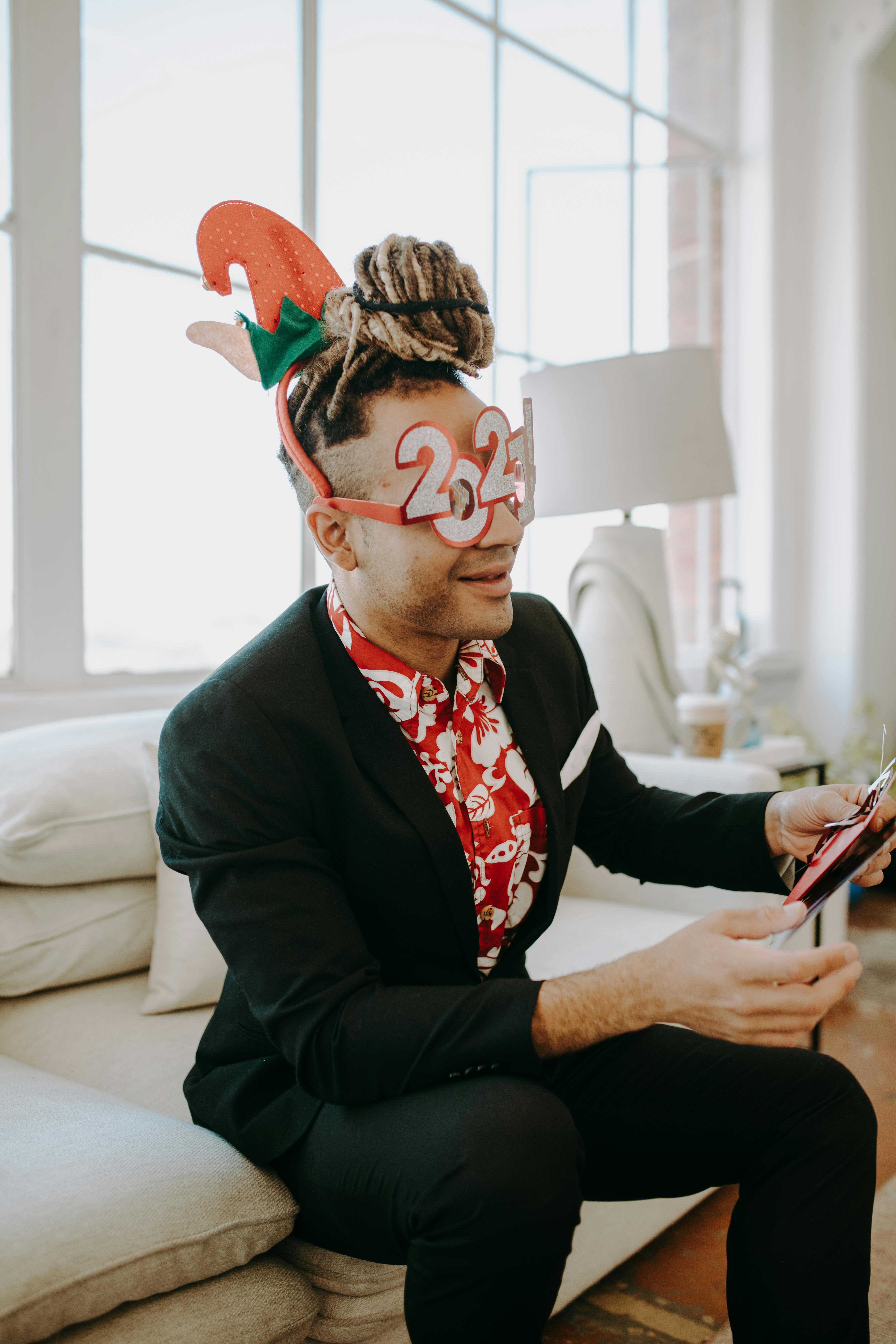 close up photo of a male professional wearing christmas prop