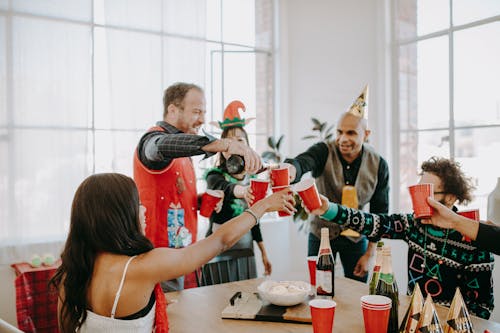 People Toasting their Cups of Wine