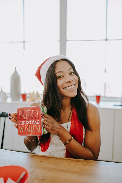 Happy Woman holding a Present 