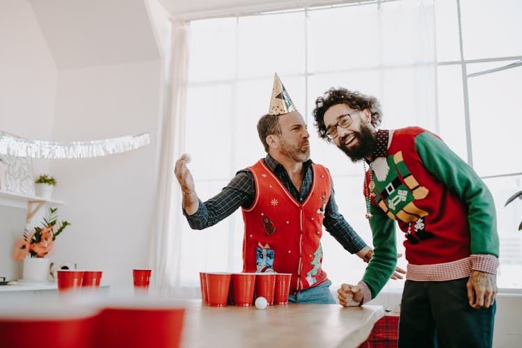 Happy Colleagues Playing Beer Pong