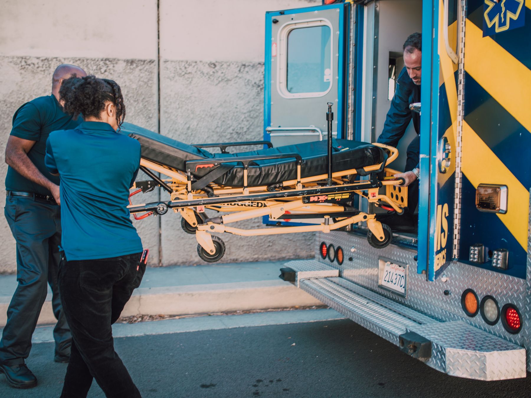 Hillside — man and van team loading a removal van