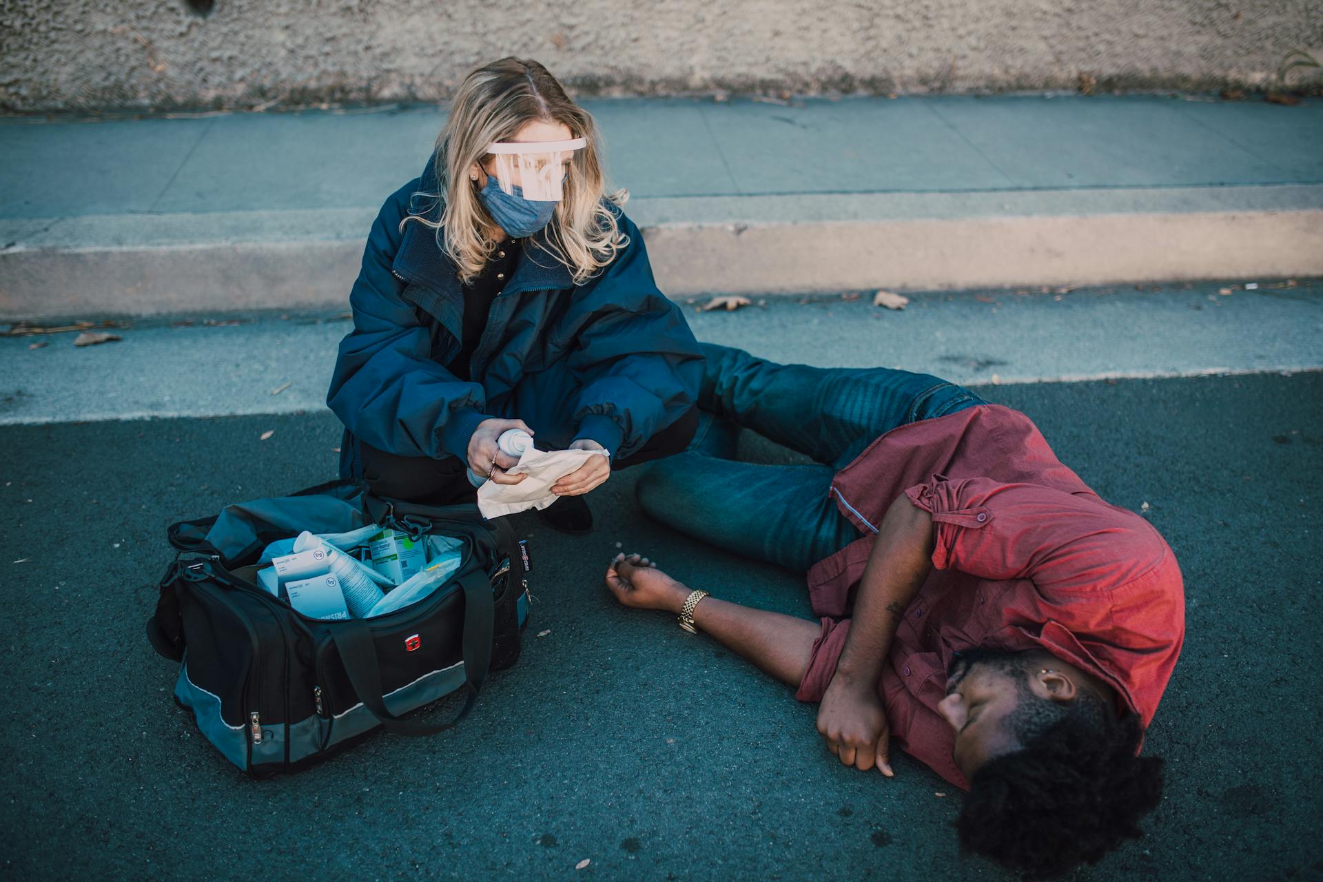 Paramedic Checking on a Man