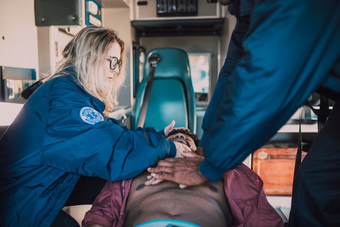 Free Paramedic Performing CPR Stock Photo