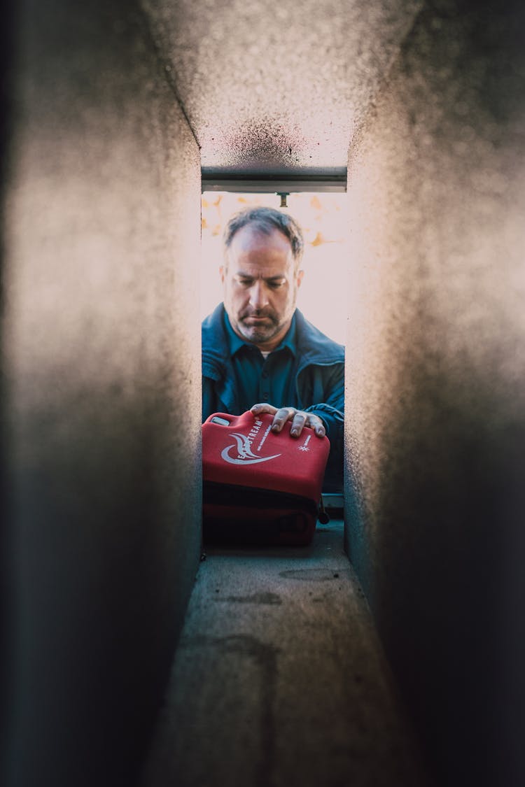 Paramedic Holding A Medical Kit