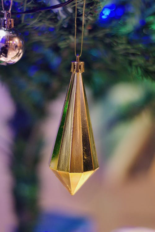 Close-Up Shot of a Christmas Decoration Hanging on the Christmas Tree