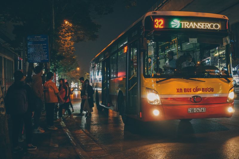 Passengers boarding a tourist bus in Hanoi, Vietnam