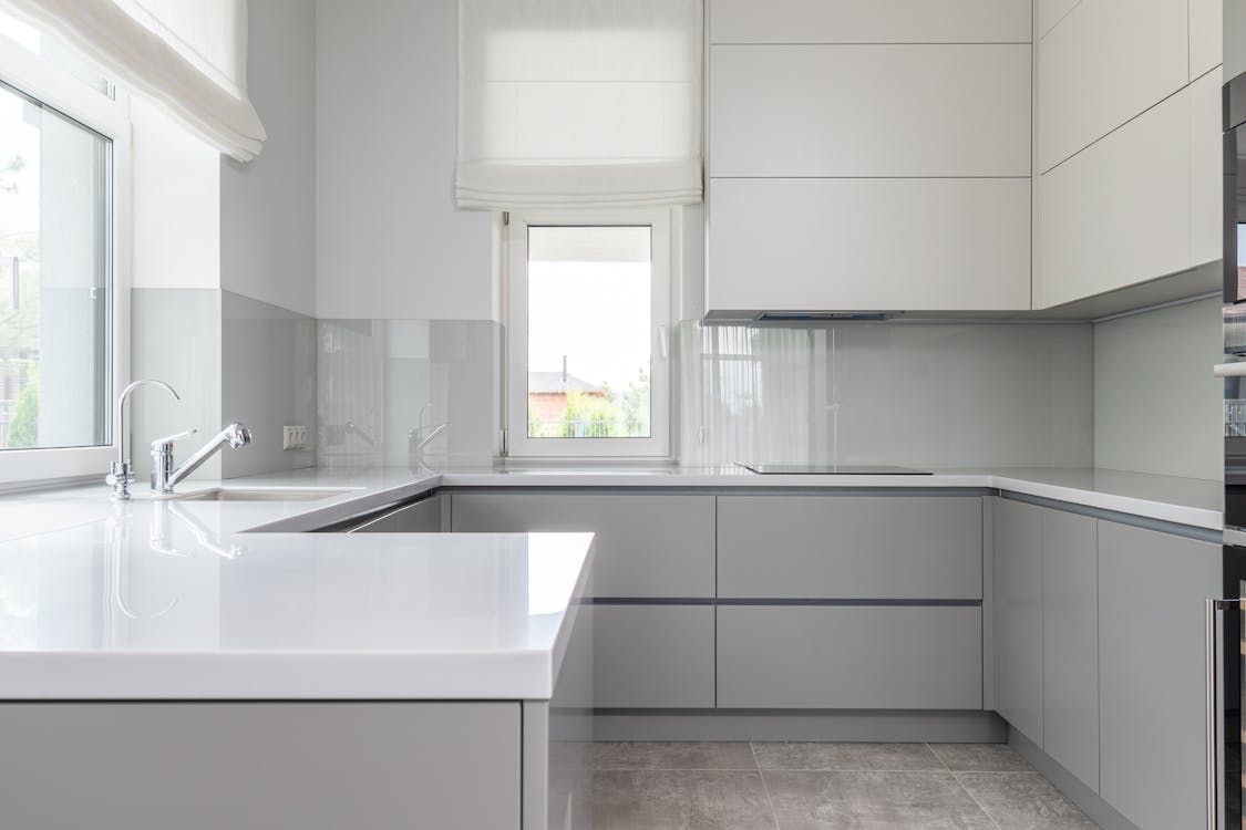 Free Contemporary kitchen with minimal white interior Stock Photo