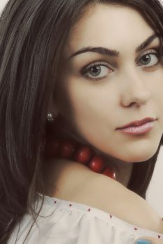 Close-up portrait of a woman in Kyiv, showcasing natural beauty and elegance.