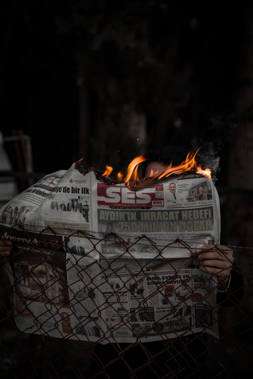 Free A Newspaper in Flames  Stock Photo