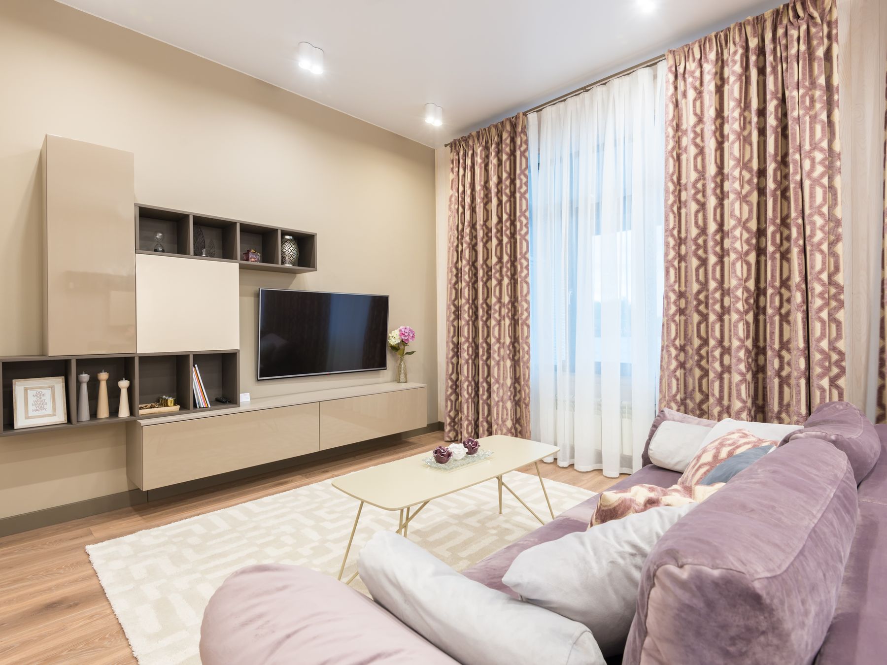 Greasby — professional movers carrying furniture on a house move