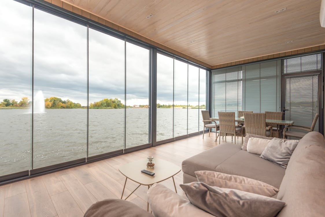 Free Interior of contemporary house on lake on cloudy day Stock Photo